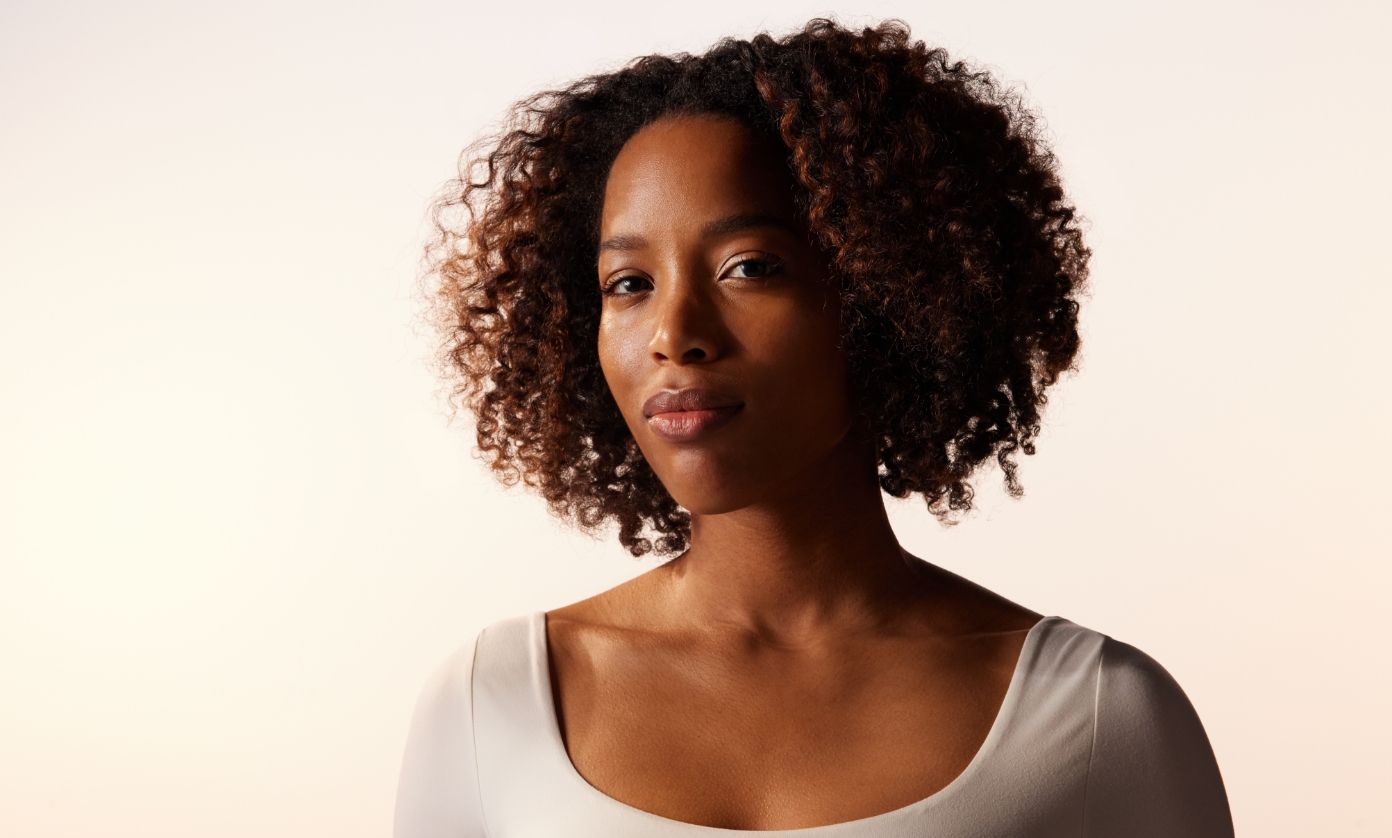 An adult woman looking at the camera.